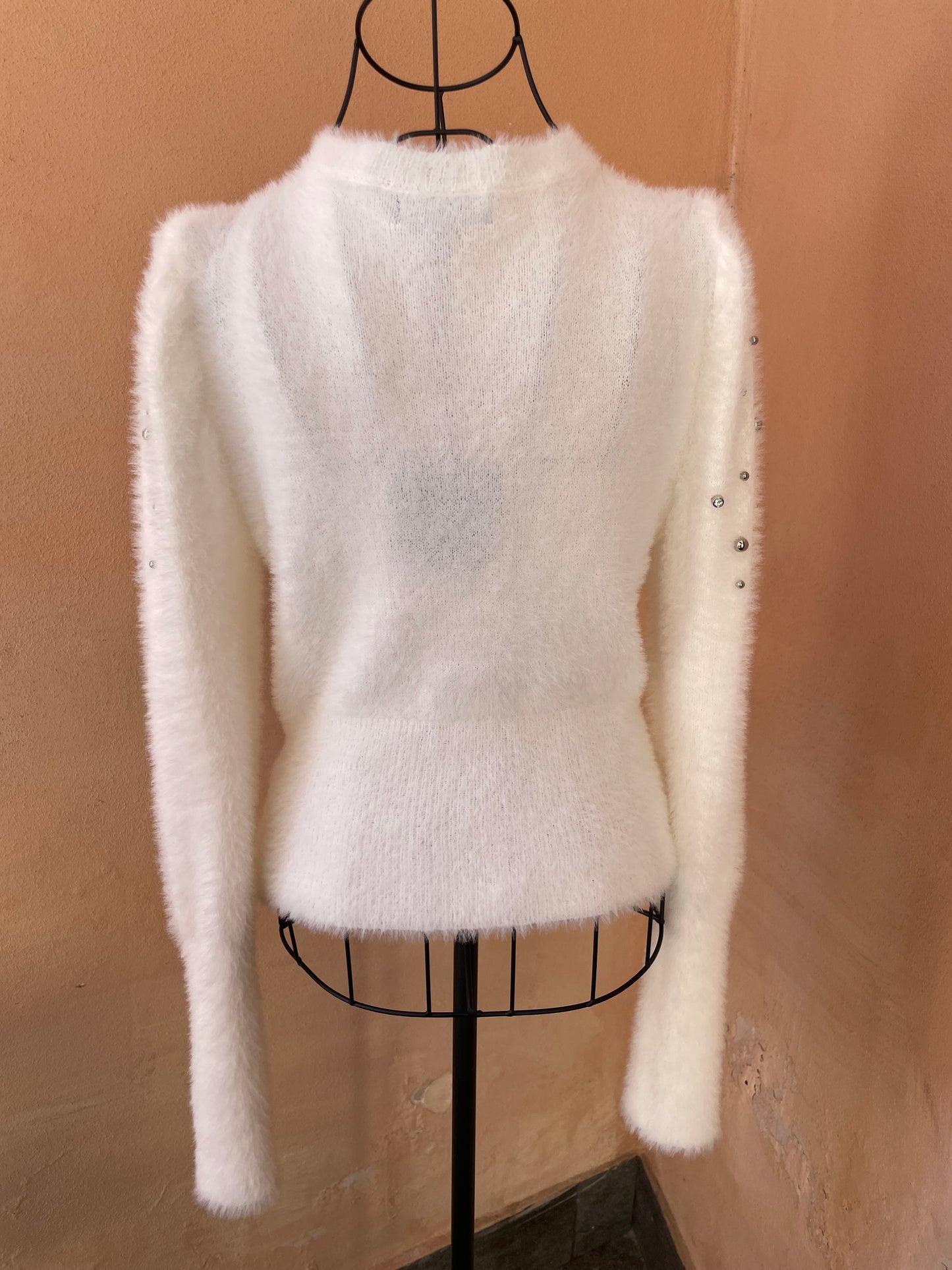 Maglione con borchie e strass