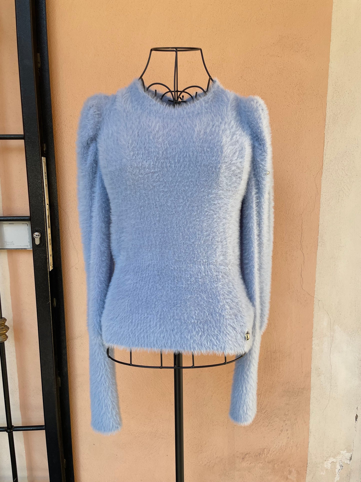 Maglione con borchie e strass
