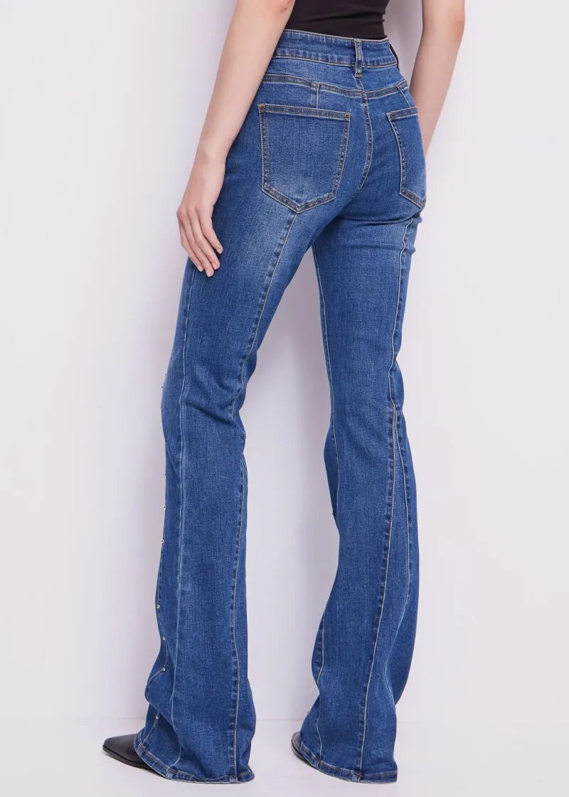 Jeans flare in cotone con borchie