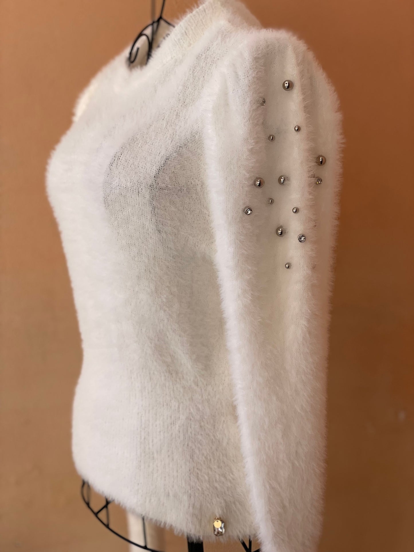 Maglione con borchie e strass