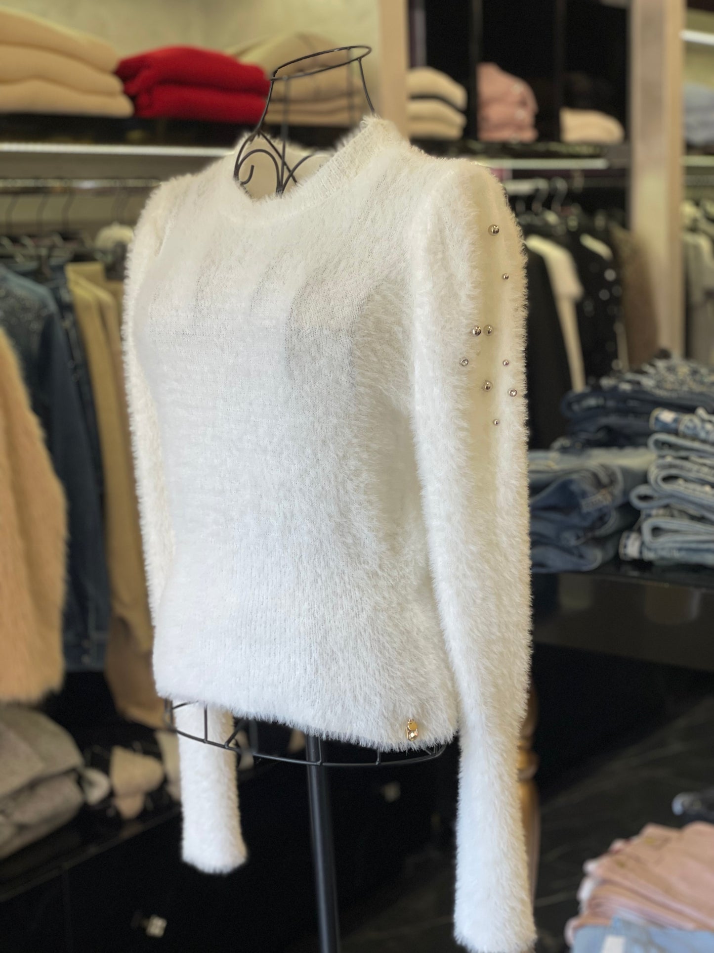 Maglione con borchie e strass